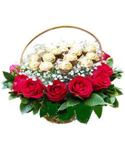 Order same-day flowers and gifts of a Ferrero Rocher Basket arrangement of 18 stems of red roses, a baby's breath, and 16 pieces of Ferrero chocolate.