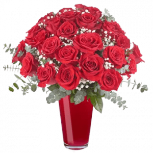 Red wine Vase arrangement with roses, eucalyptus, and baby's breath in a clear vase. Express emotions through this vibrant floral composition. Order now!