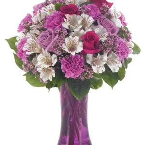 Discover the Love At First Sight astromeria, purple and hot pink roses, and carnations in a radiant bouquet. Order fresh flowers online in Nairobi today!