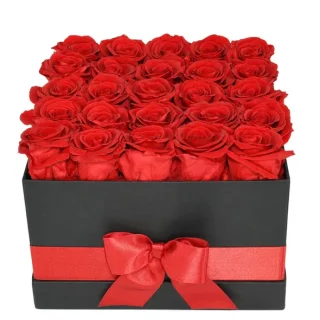 Elevate any occasion with our Red Box Arrangement, a captivating blend of richly hued blooms that effortlessly express love and sophistication.