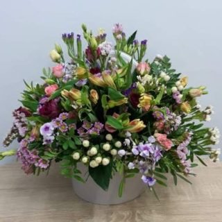 Shop for same-day fresh flower delivery in Nairobi, Kenya, with a Tropic Box of mixed tropical flowers. Order now and send happiness today.