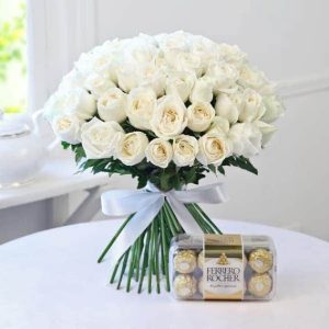 Send Winter Breeze elegance with 50 white roses and 16 Ferrero chocolates. Order same-day in Nairobi for pure love and delightful moments. #GiftsOfLove