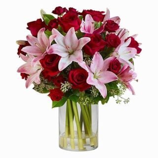 Passionate union of love and grace. Our Red Roses with Pink Lilies bouquet embodies romance and sophistication. Perfect for expressing heartfelt sentiments.