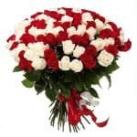 The "Golden Love Bouquet" features 99 red and white roses, symbolizing unity and enduring love, perfect for special occasions.