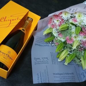 Shop a fresh romantic Valentine package of 750 ml Veuve Clicquot, 10 stems of oriental lilies, carnation, 20 stems of chrysanthemums, and baby's breath.