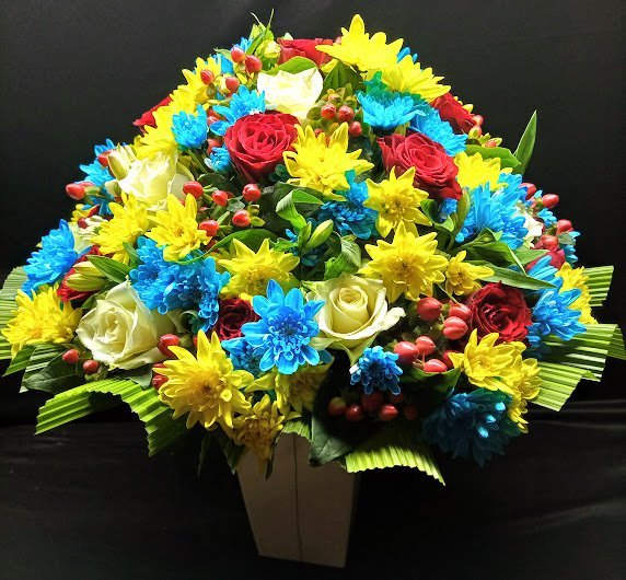 Shop same-day fresh Colorful Summer times bouquets with hypericum, yellow and blue chrysanthemums, alstroemeria, greenery, and white and red roses