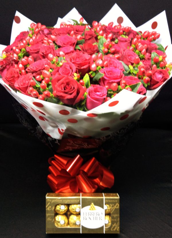 Send joy with the Cool Breeze Smile Bouquet of red roses, hypericum, and Ferrero chocolates. Shop same-day flowers and gifts online in Nairobi, Kenya
