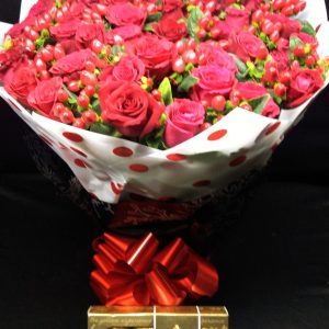 Send joy with the Cool Breeze Smile Bouquet of red roses, hypericum, and Ferrero chocolates. Shop same-day flowers and gifts online in Nairobi, Kenya