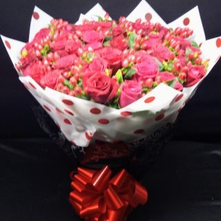 Same-day flower delivery in Nairobi, a sweet valentine bouquet of red roses and berries. Share love and passion with friends and family. Order now!