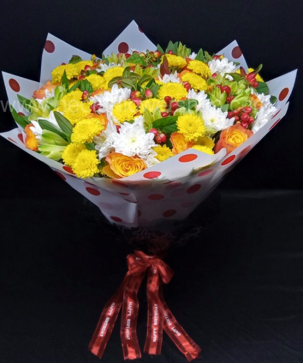 Summer Times bouquets of orange roses, yellow and white chrysanthemums, alstroemeria, and red berries make it the perfect bouquet to express yourself better.