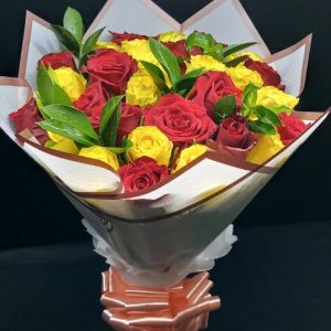 Capture the essence of joy with our Red & Yellow Roses bouquet. Vibrant colors, timeless beauty, Order now for a burst of happiness!