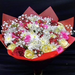 Shop same-day flowers and gifts delivery in Nairobi, Kenya; a sweet happiness bouquet of white, red, and pink roses; a baby's breath, and white chrysanthemums