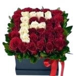 Discover elegance in our Initial Box Arrangement, a personalized touch to bloom your moments. Tailored beauty, curated just for you, customize your flowers