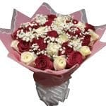 Elevate any moment with our Mixed Flower Hand Bouquet with red and white roses and baby