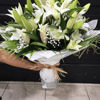 Experience the divine allure of our 'Heaven Scent Lilies' bouquet, Fresh lilies, and baby's breath unite in a fragrant symphony, adding a touch of beauty