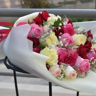 Dazzle with the Princess Bouquet: 3 dozen red, white, and pink roses with a baby's breath. regal expression of love and elegance. #RoyalFlorals"