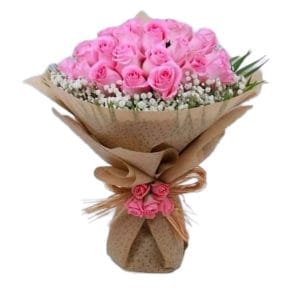 Order same-day flowers of the Smile bouquet of pink roses and a baby's breath arrangement. Share gratitude and admiration for family and friends