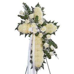 White funeral flower cross with roses and chrysanthemums, sympathy floral arrangement for memorial services, available for online delivery.