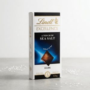 Lindt Excellence Chocolate 100g bar paired with fresh cut export Kenyan crimson red roses and white gypsophila by Flower Delivery Nairobi