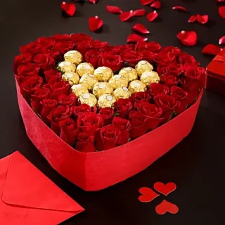 Shop the Iconic Love heart box arrangement of 40 stems of red roses and 16 pieces of Ferrero chocolate. Order now and send happiness today
