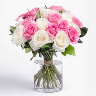 Order a same-day pink white flower a vase of fresh roses and a clear vase. share a smile and celebrate a special moment with the one you care about.