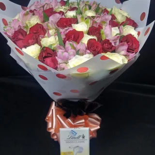 same-day flowers bouquet of two dozen red and white fresh roses and 10 stems of alstroemeria,
