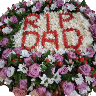 Order Last Respect Round Wreath with purple roses, red hypericum, white chrysanthemums with a customized initials delivery in Nairobi, Kenya