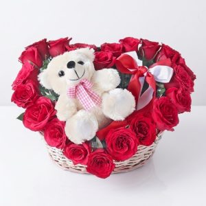 Heart-shaped chocolate Teddy basket with fresh red roses and 16 Ferrero Rocher chocolates