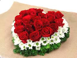 Shop Spring Fresh love box arrangements of red roses, and white chrysanthemums. Order now! for Nairobi delivery with Flower Delivery Nairobi.