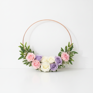 Wedding hoop bouquet with pink, purple and white roses, baby’s breath and greenery in Nairobi Kenya.