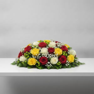Oval table flower arrangement with red yellow and white roses in Nairobi