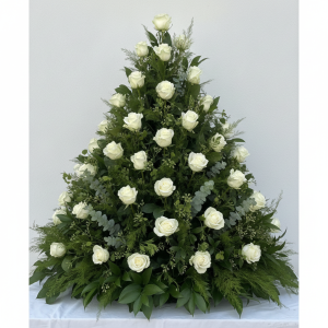 Triangular Alta Arrangement with white roses and greenery in Nairobi